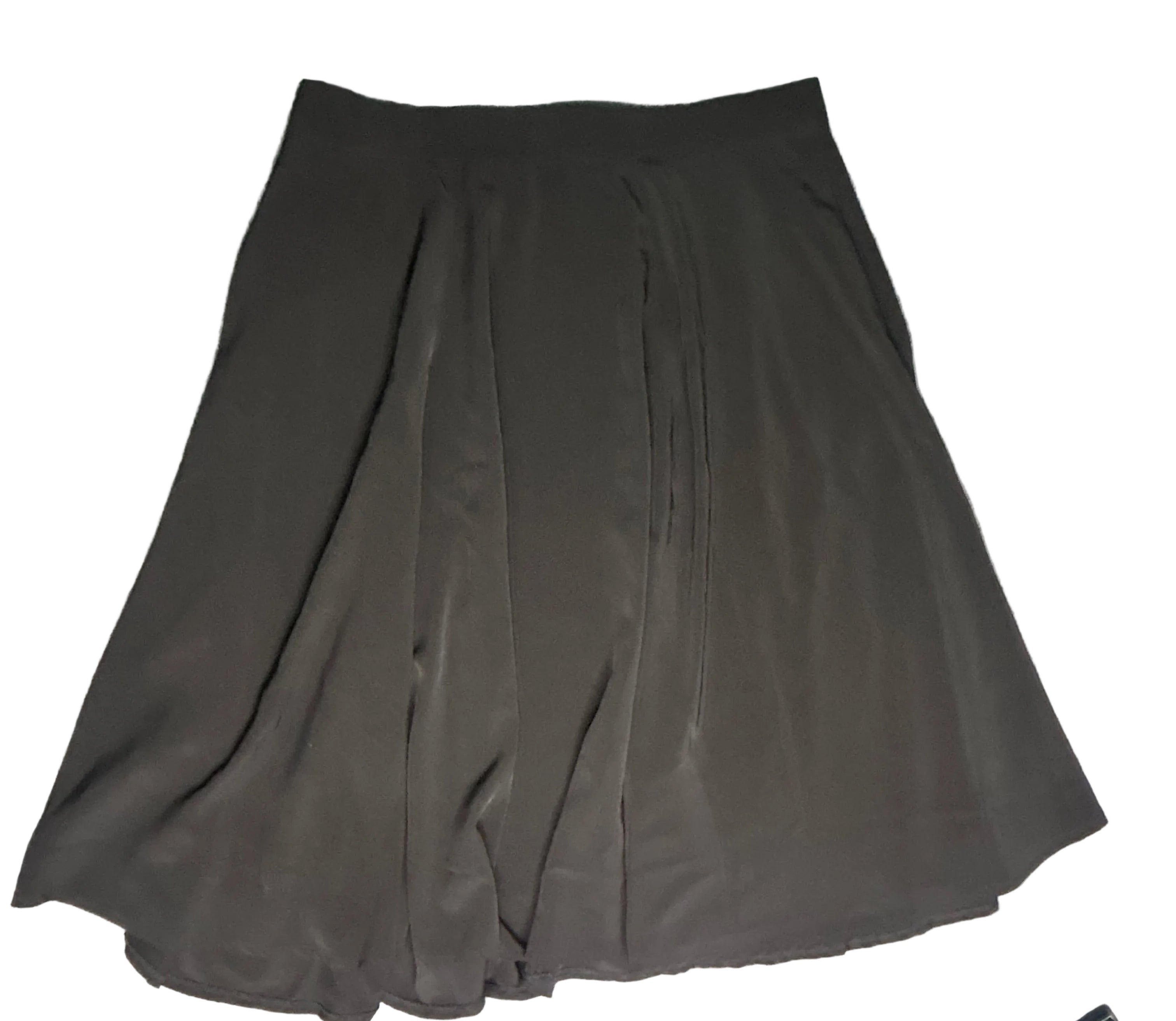 Black skirt on a gray surface