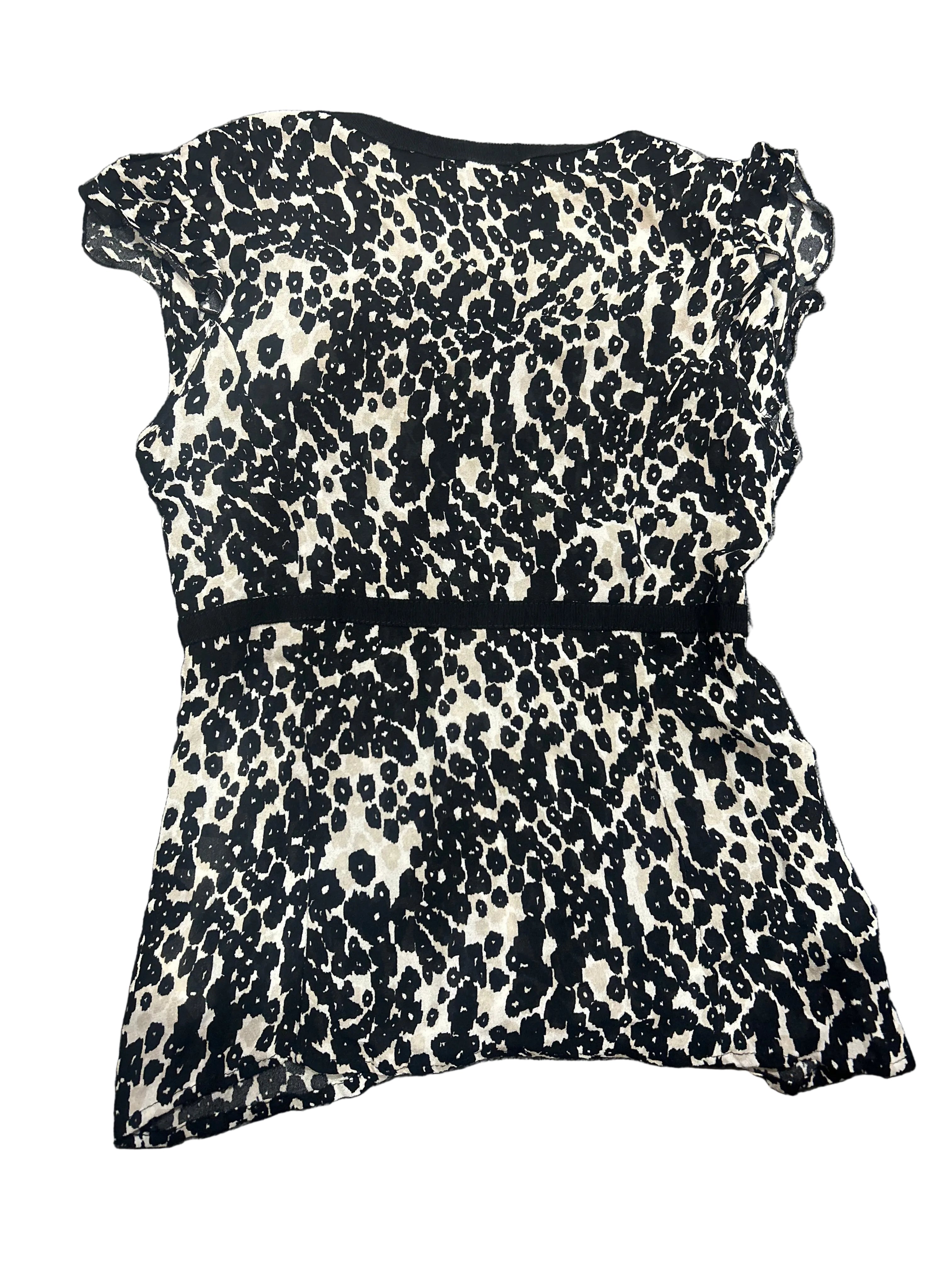 Leopard print top on a gray background