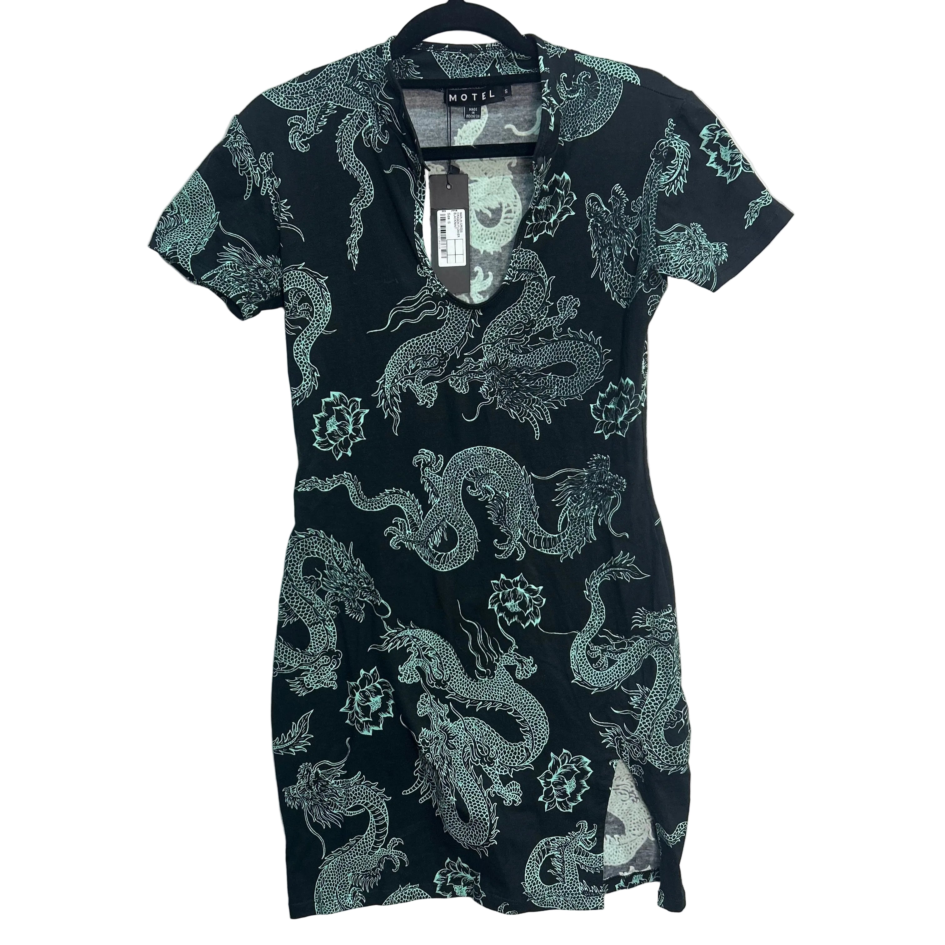 Black dress with dragon pattern on a white background