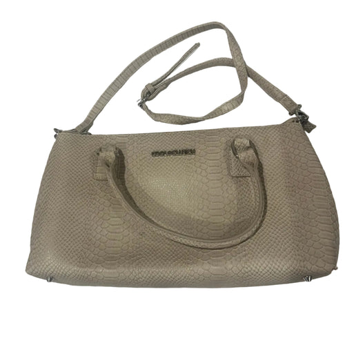 Beige handbag on a white textured surface