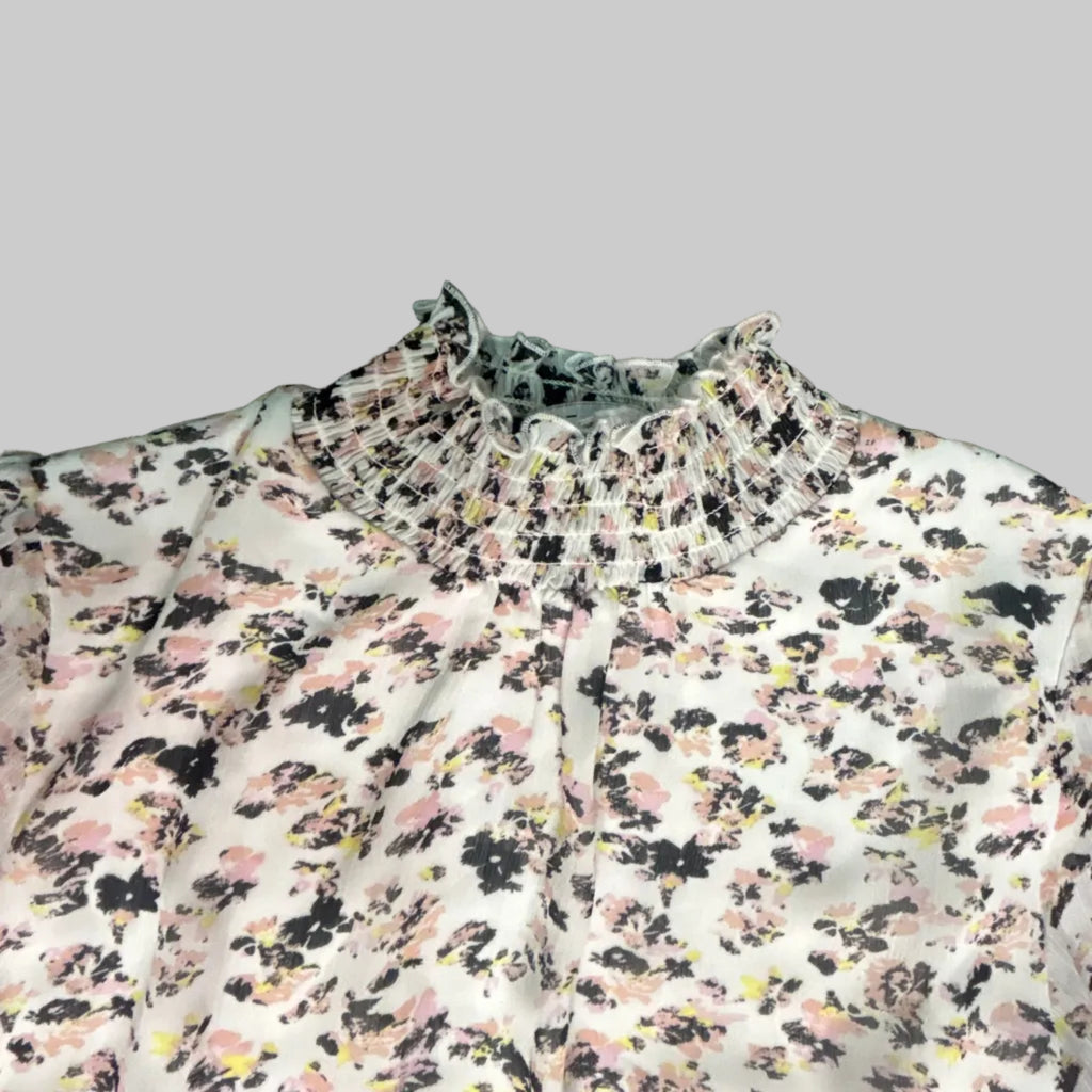 Floral patterned fabric on a dark background