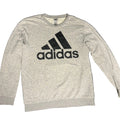 Gray Adidas long-sleeve shirt on a dark gray background