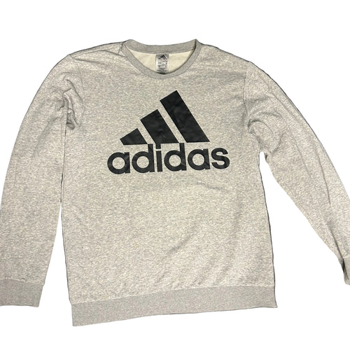 Gray Adidas long-sleeve shirt on a dark gray background
