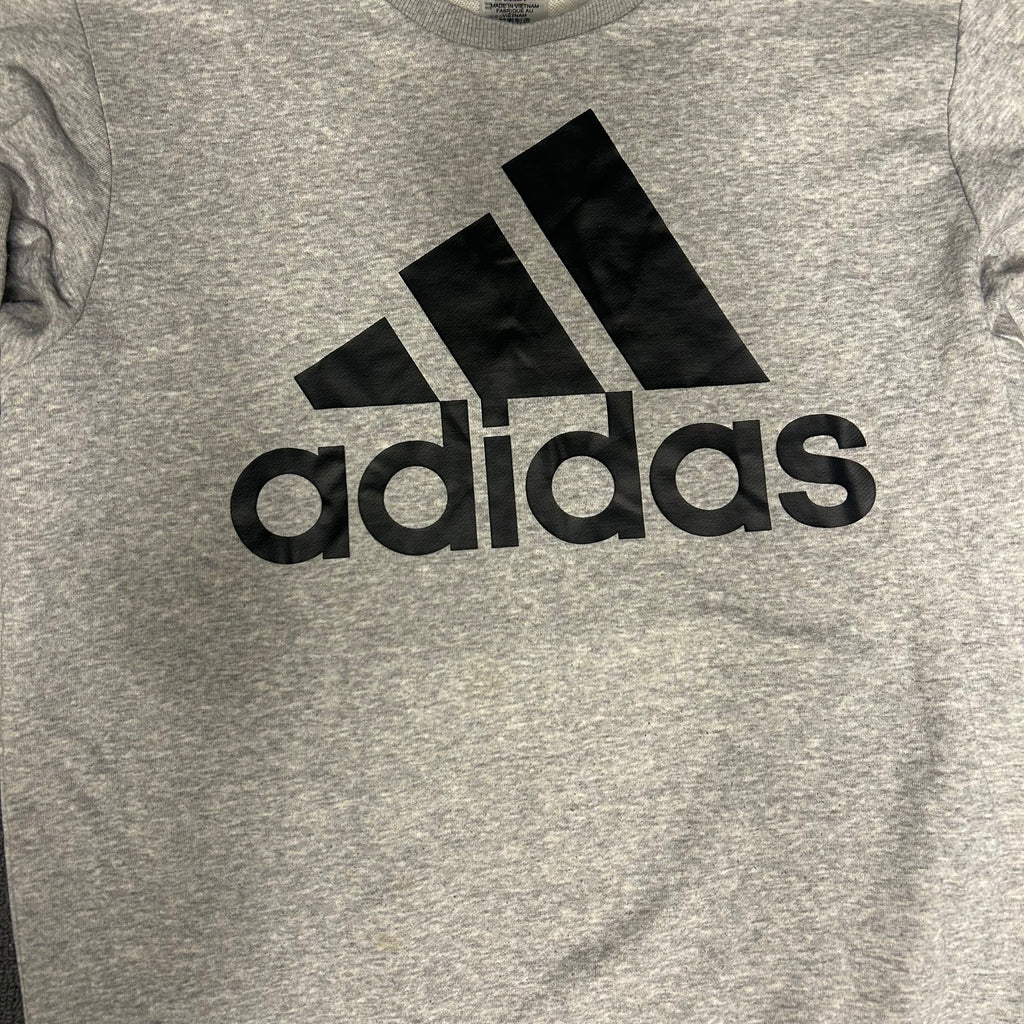 Adidas logo on a gray t-shirt