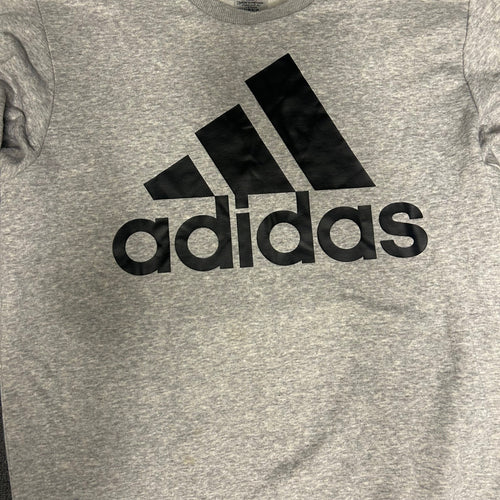 Adidas logo on a gray t-shirt