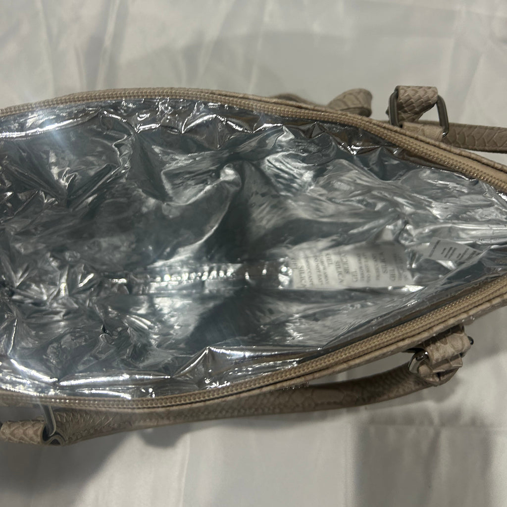 Clear plastic bag inside a beige pouch on a textured white surface