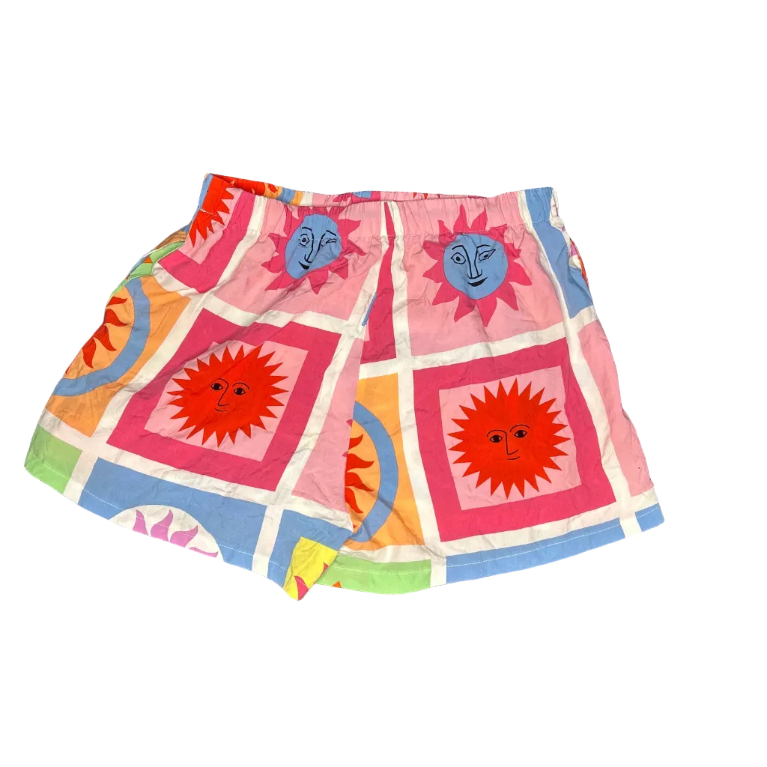 Colorful baby diaper with sun and moon design on a gray background